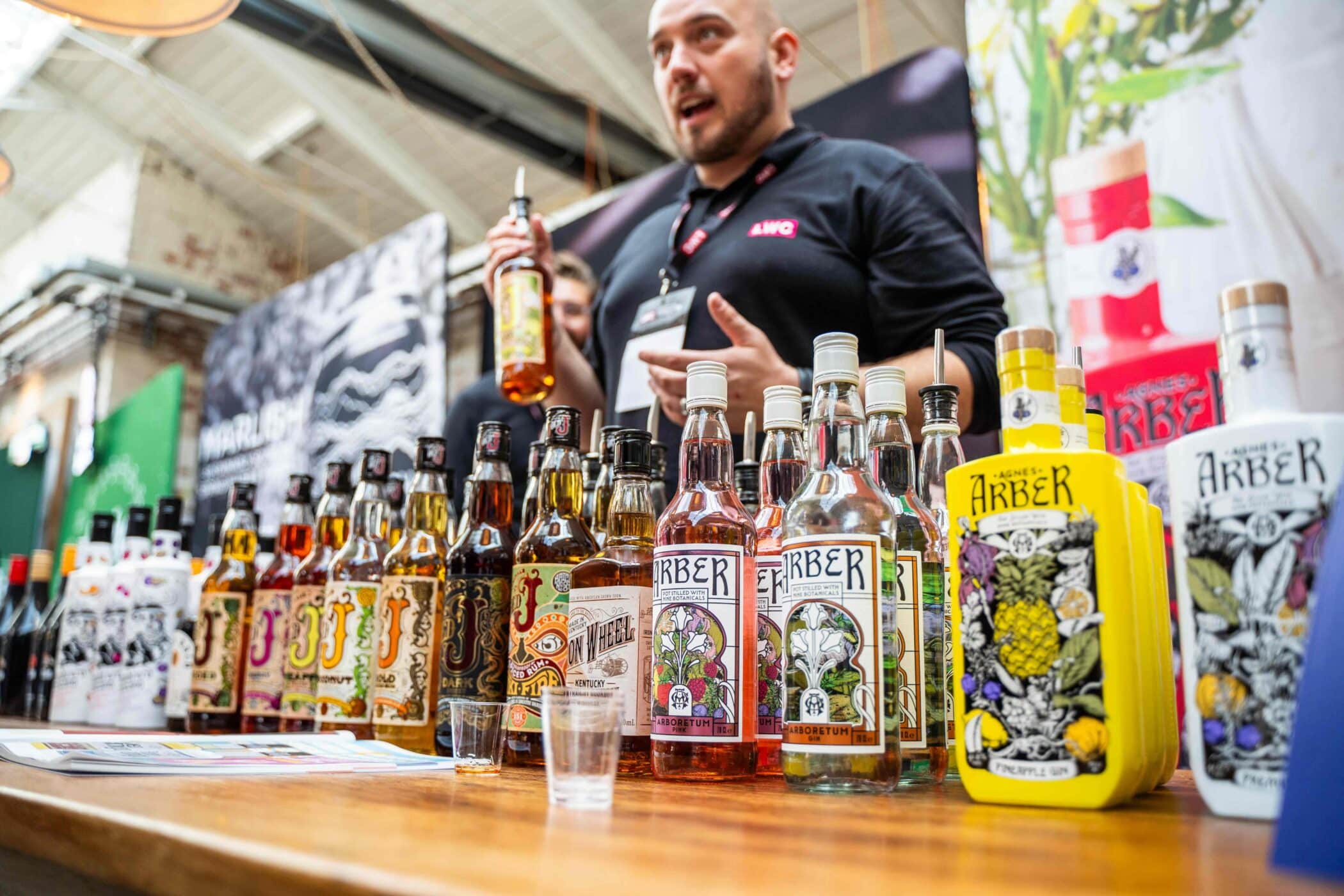 Range of LWC Gin, Rum, and Whiskey Spirits at a trade show